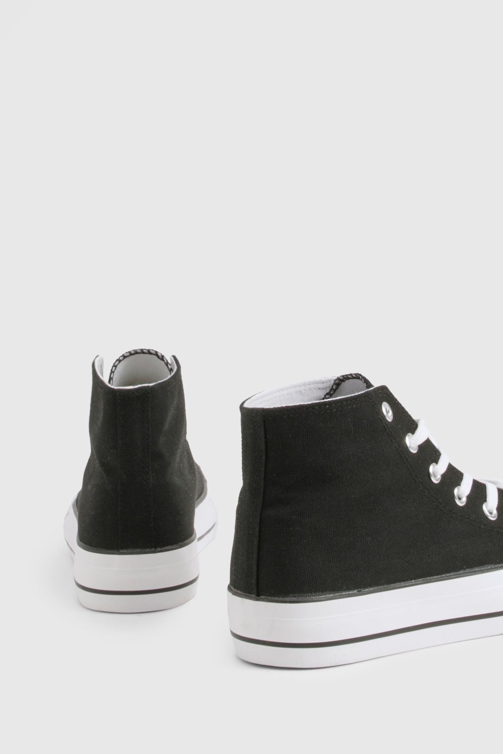 Black high-top platform trainers