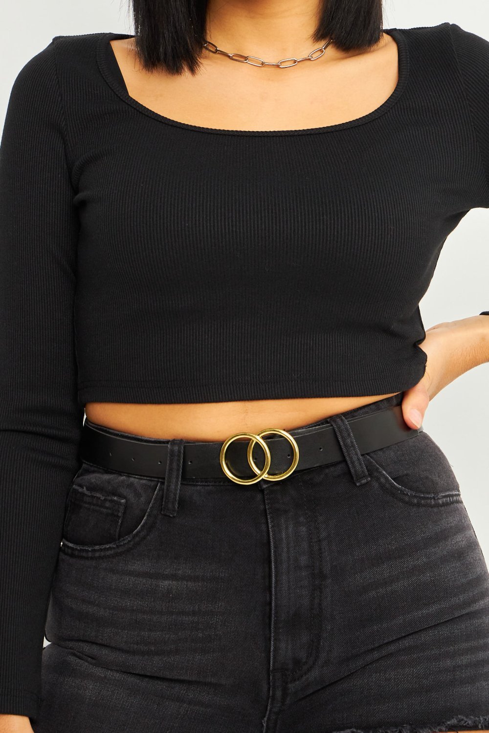 Black belt with gold double-ring buckle