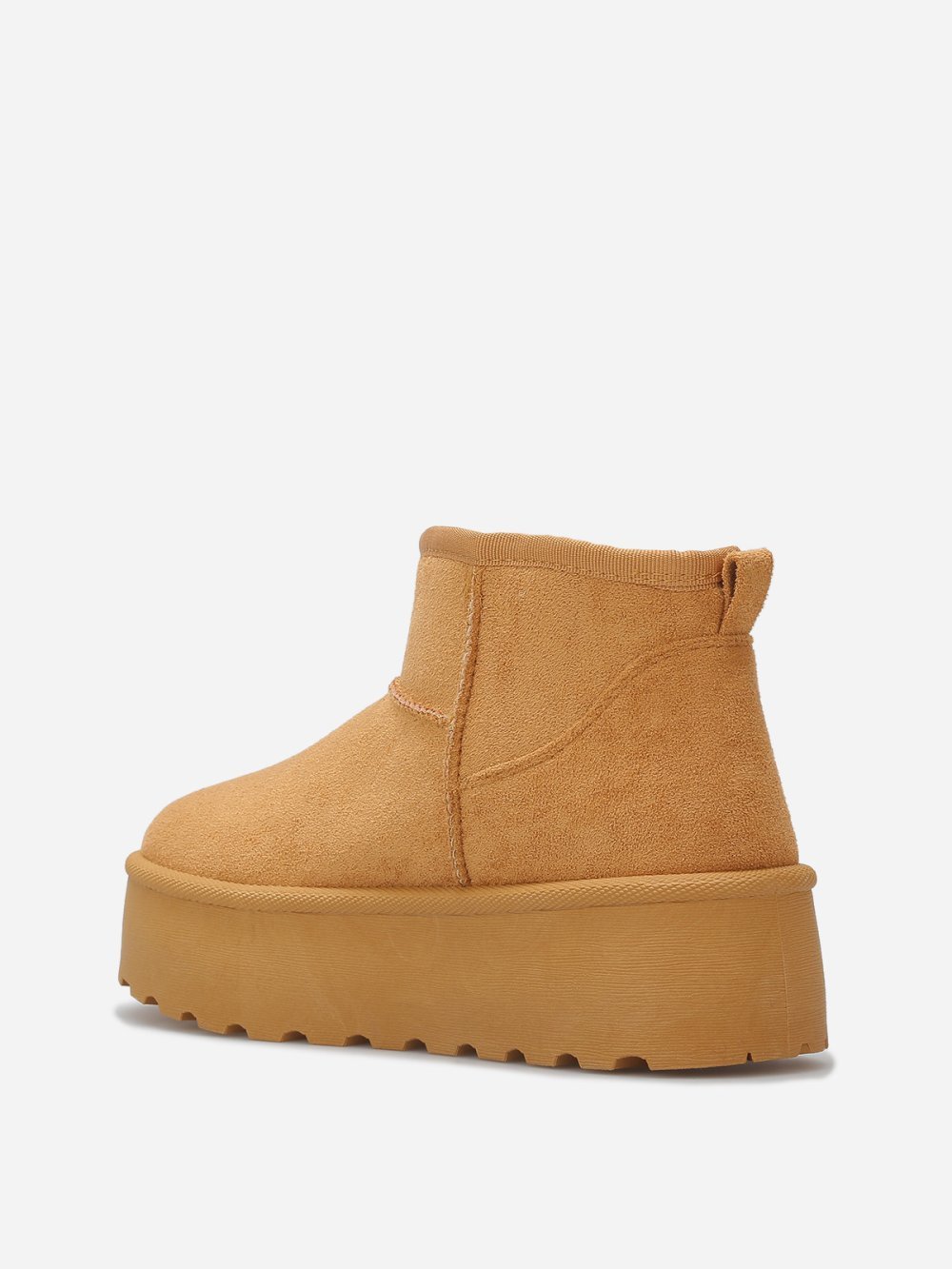 Boots basses fourrées à surpiqûres camel