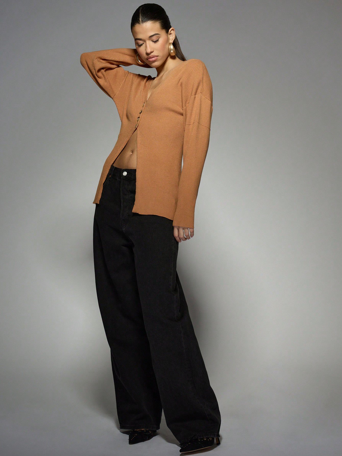 Cardigan asymétrique en maille côtelée avec boutons