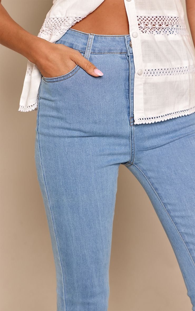 Blue five-pocket flared jeans