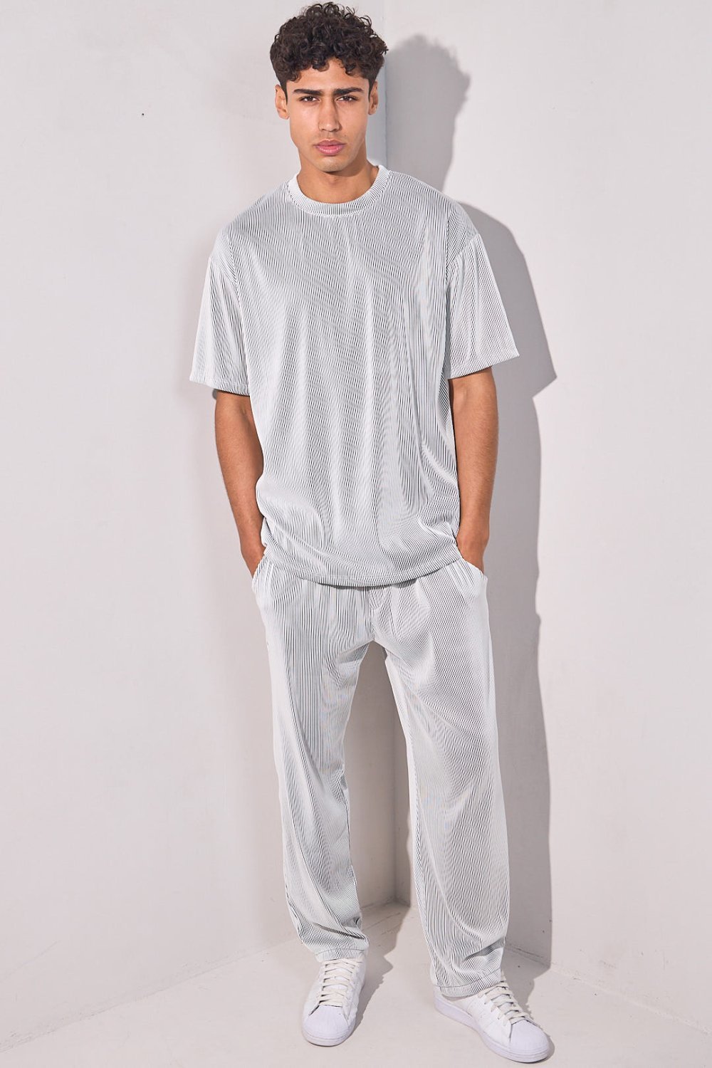 White pleated t-shirt and trousers set