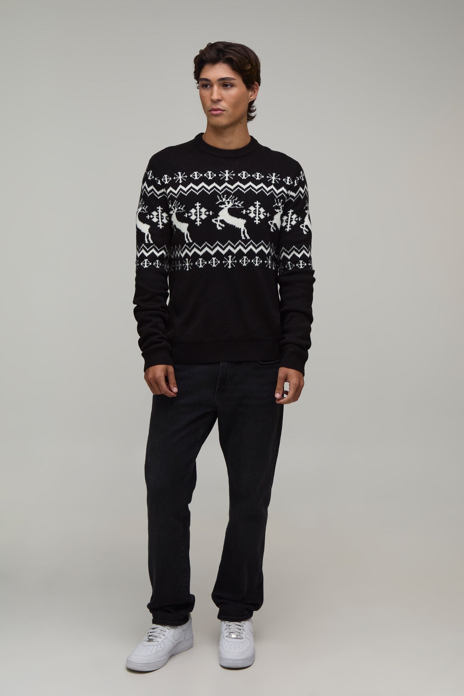 Christmas jumper with reindeer pattern