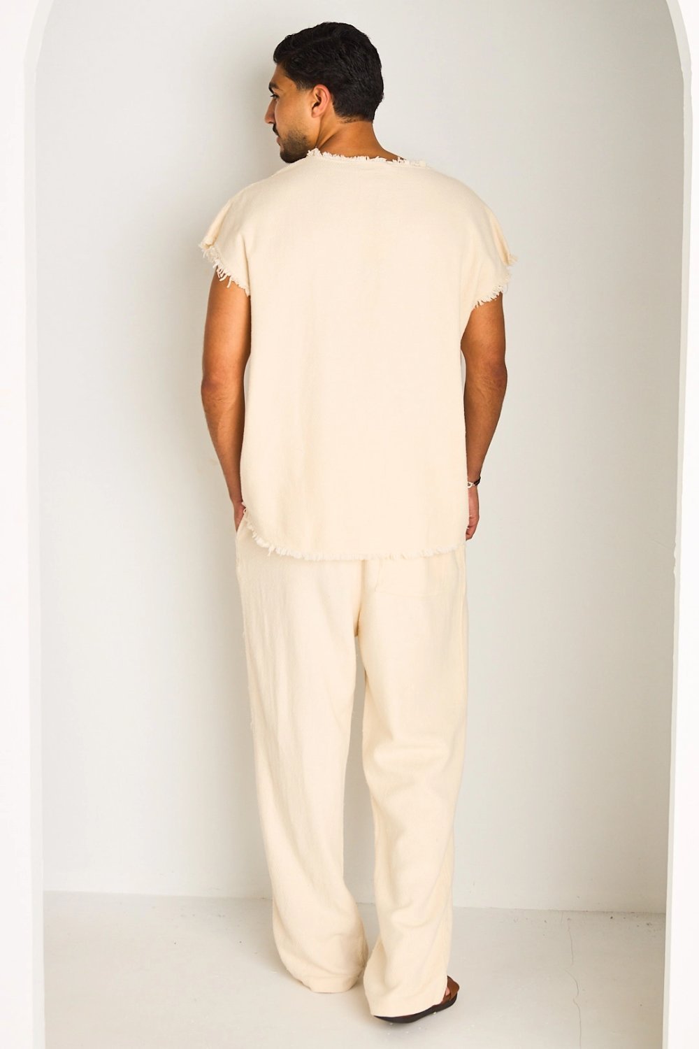 Ensemble débardeur et pantalon effiloché beige