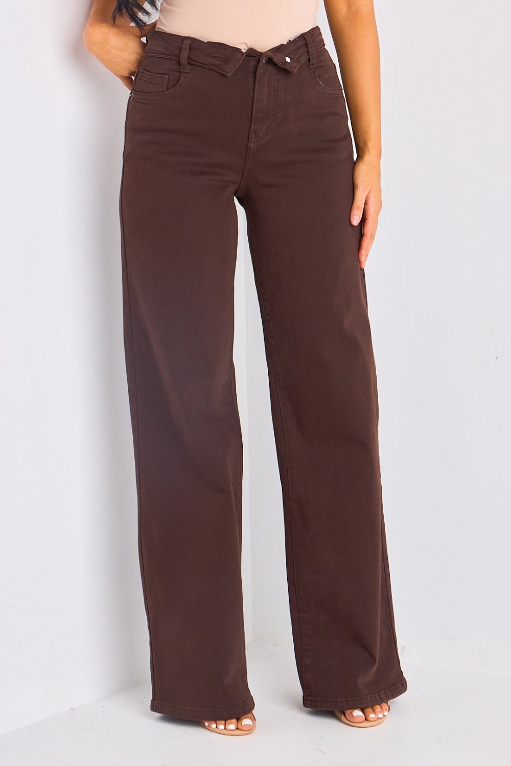 Brown turn-up flared jeans with double fastening